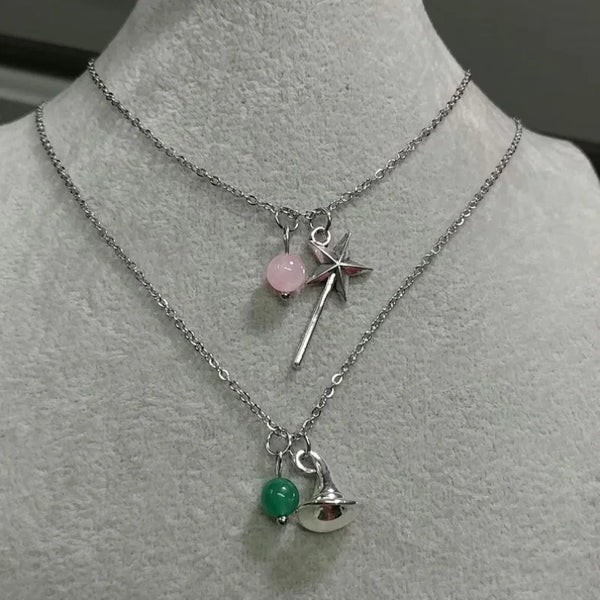 Wicked Duo Charm Necklace Set - Elphaba / Glinda Edition